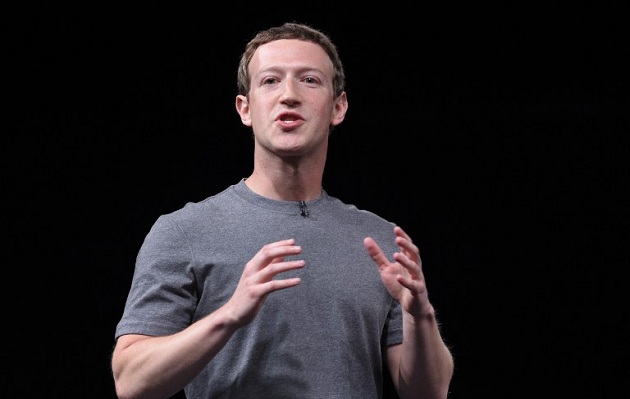 Chairman, chief executive, and co-founder of the social networking website Facebook Mark Zuckerberg speaks during a press conference presenting Samsung's new Galaxy 7 mobile device, on the eve of the official opening of the Mobile World Congress in Barcelona on February 21, 2016. The world's biggest mobile fair, Mobile World Congress, is held from February 22 to February 25. / AFP PHOTO / LLUIS GENE